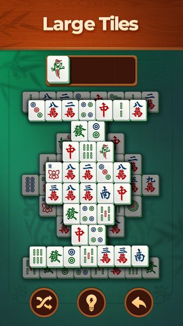 Vita Mahjong on iPhone showing an oversized tile layout under the caption Large Tiles